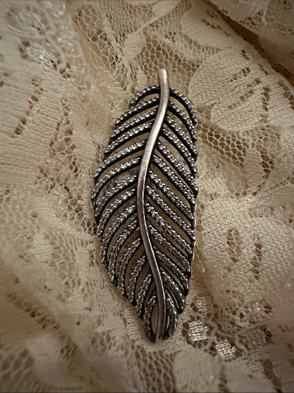 Pandora sterling silver.  Feather pendant with Sparkle Accents